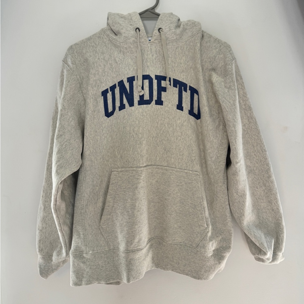 Undefeated Gray Crewneck Hoodie with Navy UNDFTD Arch